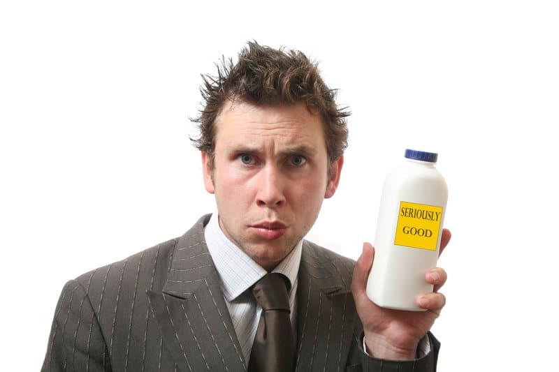 Salesman with a milk bottle