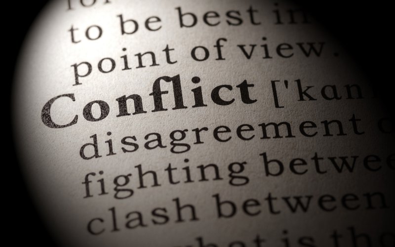 Conflict written on a paper