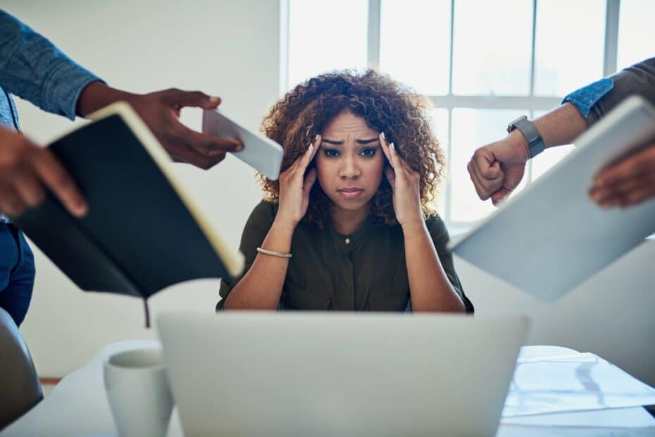 The stressed woman represents the phrase, "I don't want to work!"