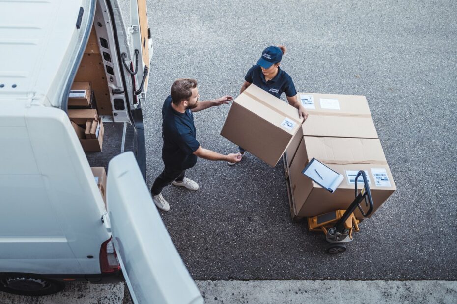 Boxes being loaded on a Van, demonstrating a type of transportation job.