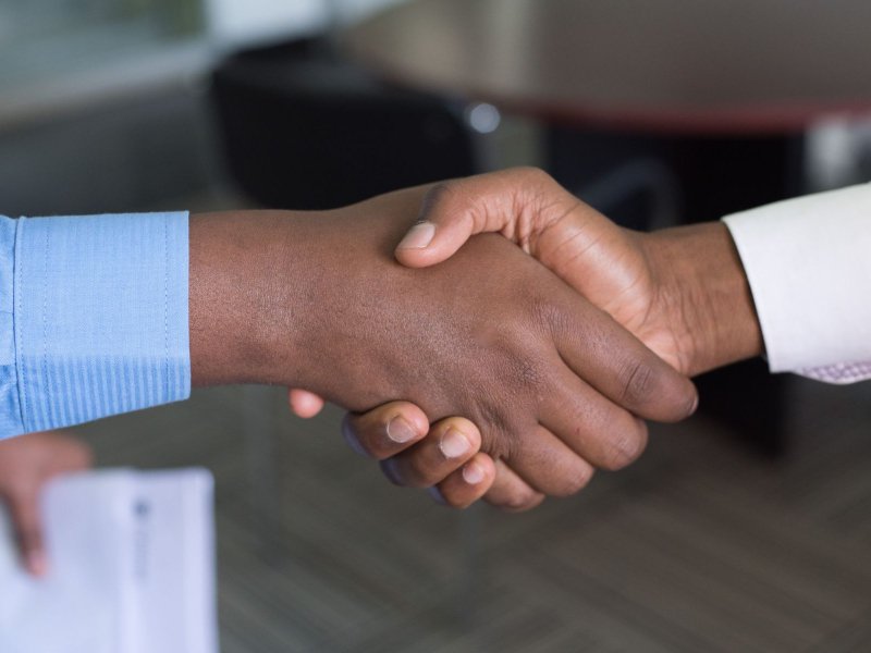 Shake hands representing a successful relationship with your digital marketing consultant