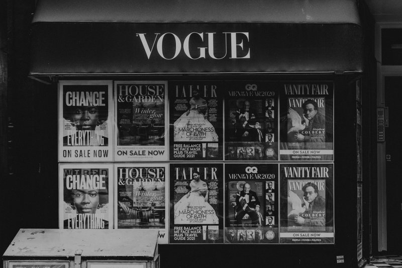 Many magazines on a Vogue display