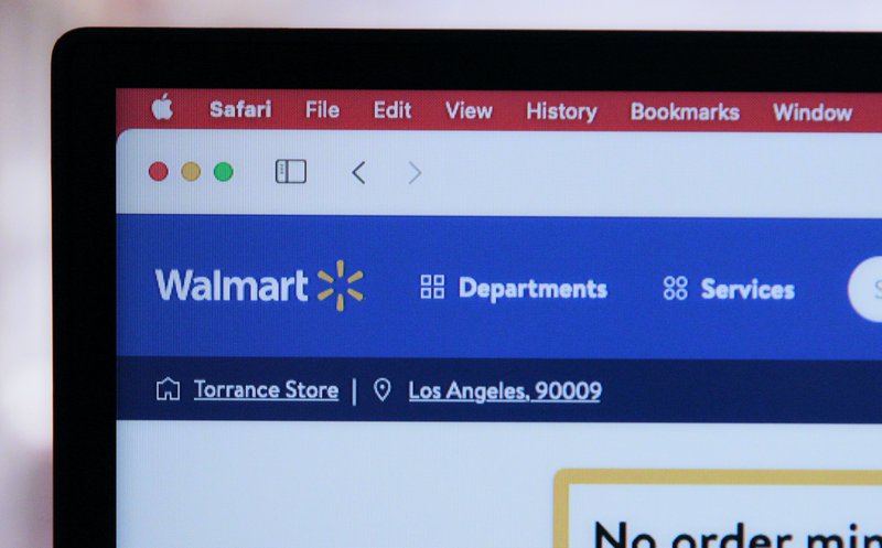 Waht is a cost leadership strategy? Walmart illustrates it well. In this image, a computer screen with the walmart logo on it